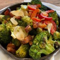 Spicy Charred Broccoli · Hot cherry peppers, pancetta, garlic and butter. Gluten free.