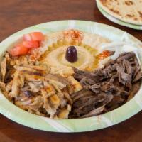 Combination Plate · A combination choice of 2 meats. Includes small salad, rice or fries, pita bread, house sauc...