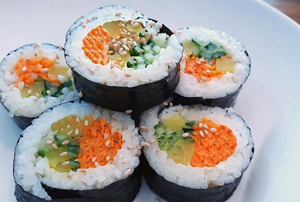 Vegetable Roll · Double seasoned cucumber, carrot, and pickled radish.