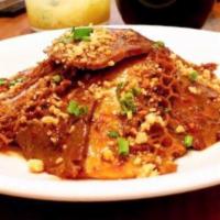 Beef and Ox Tripe with Spicy Pepper Sauce 夫妻肺片 · Hot and spicy.