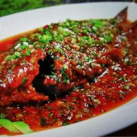 Braised Whole Fish with Hot Bean Sauce 豆瓣鱼 · Hot and spicy.