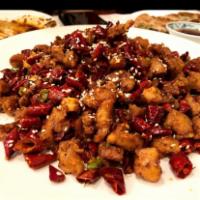 Mountain Spicy Chicken 歌乐山辣子鸡 · Fried boneless dice chicken Sautéed with pepper corn and red dry pepper