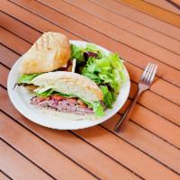 3. Roasted Beef Sandwich · Roasted beef, lettuce, tomato, caramelized onion, Swiss cheese, mayonnaise and mustard.