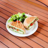 2. Chicken and Pesto Panini · Grilled chicken, provolone cheese, pesto sauce, roasted red pepper and caramelized onion.