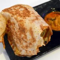A1. Roti Canai · Indian pancake served with curry chicken sauce. Spicy.