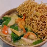 N5. Clay Pot Noodle Soup · Clay pot noodle served with chicken, shrimp and vegetable.