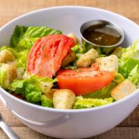 Caesar Salad · Romaine lettuce, tomatoes, croutons and Caesar dressing.