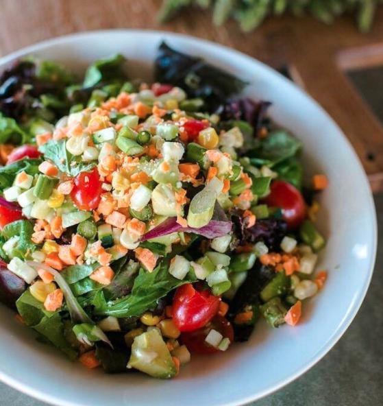 Vegetable Salad · Organic spring mix, carrots, asparagus, cucumbers, corn, tomatoes, avocado, zucchini, Parmesan and red wine vinaigrette. Gluten-free.