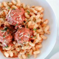 Pasta and Meatballs · Cavatappi pasta (corkscrews) with red sauce and our house-made meatballs, topped with Parmes...