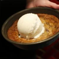 Pizza Cookie · Half-baked triple chocolate chip cookie dough made in-house daily, topped with a heaping sco...