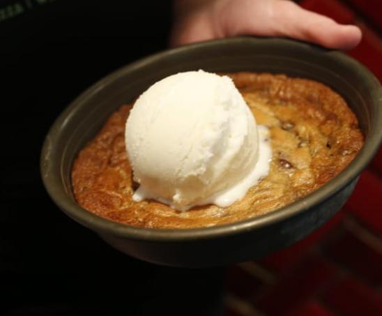 Pizza Cookie · Half-baked triple chocolate chip cookie dough made in-house daily, topped with a heaping scoop of all-natural gelato.