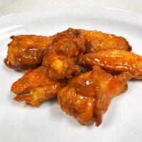 Classic Chicken Wings · Buffalo –traditional (Bone-In) chicken wings hand tossed in a buttery flavor profile with ag...