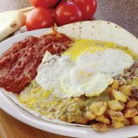 Carne Adovada Rancheros Platter Breakfast · Our twist of the classic. Our specialty shredded pork marinated in red chile. Served with pa...
