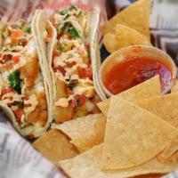 Baja Fish Taco · 2 battered fish fillet tacos, double wrapped in corn tortillas with pico de gallo and spicy ...