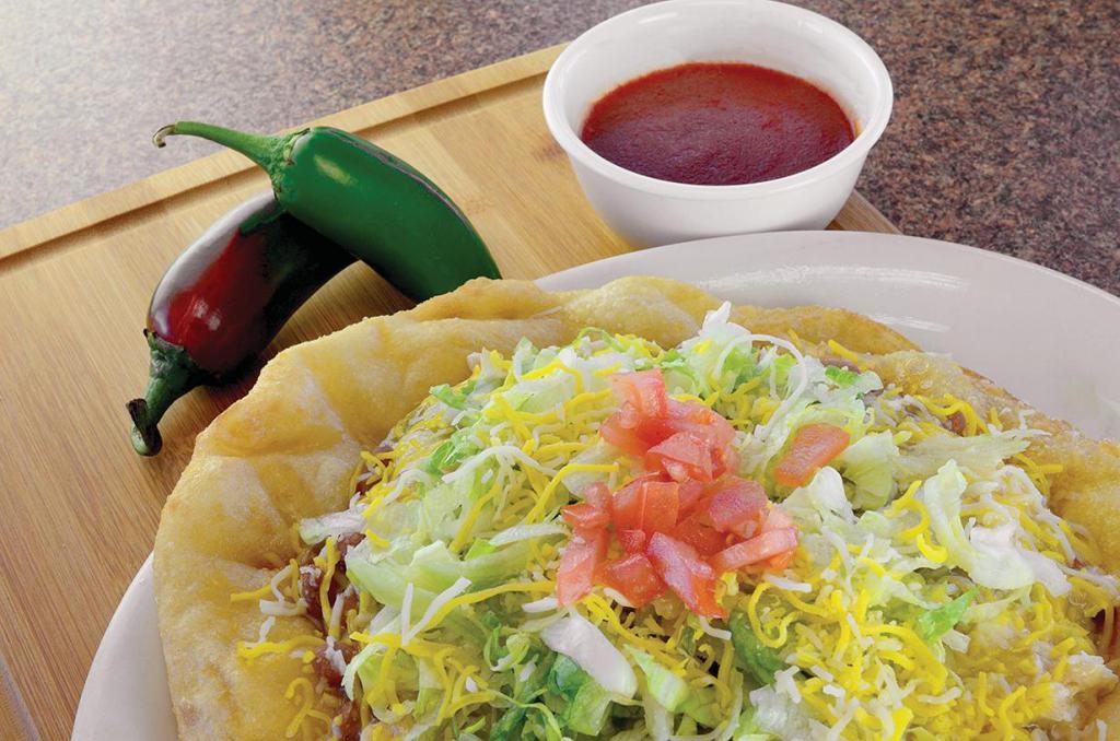 Indian Taco · Indian Fry bread with choice of meat and chilli, beans, cheese, lettuce and tomato.