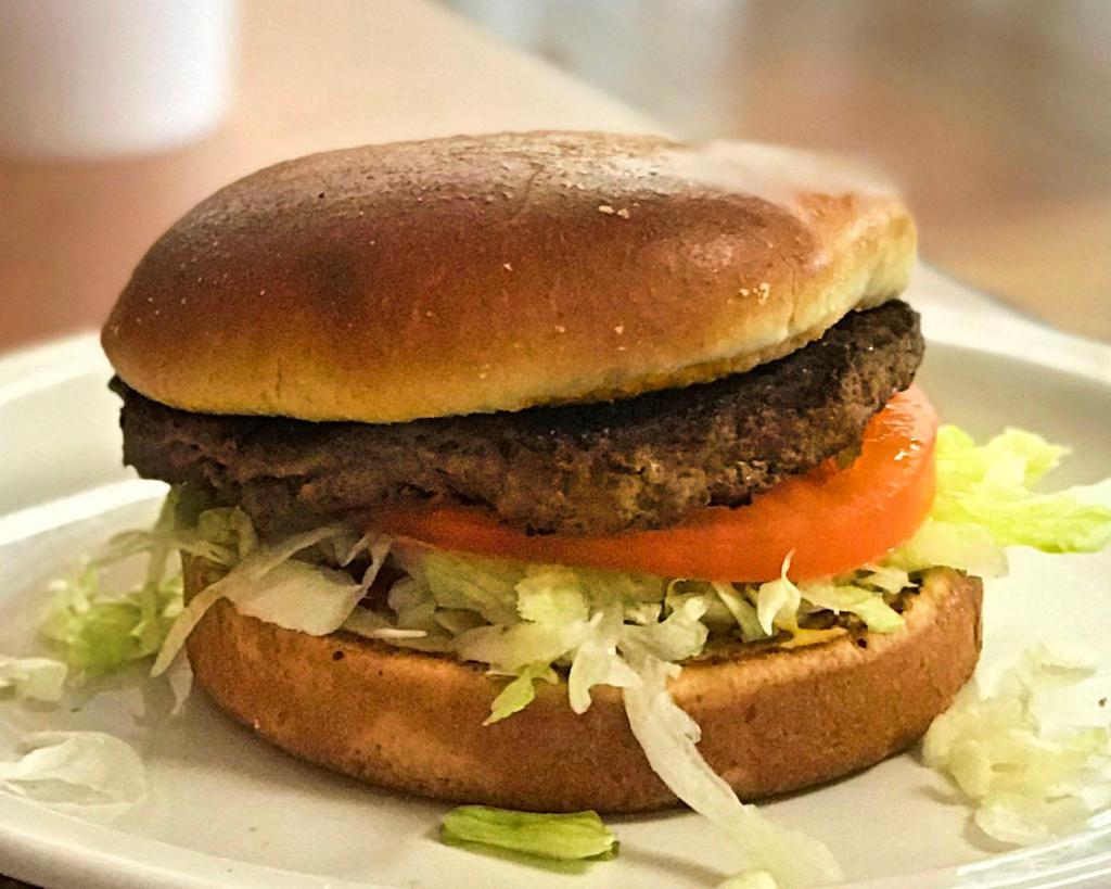 All American Burger · Grilled bun, lettuce, tomato, onion, mustard and ketchup. Made with 100% all Angus beef patties. 810 calories.