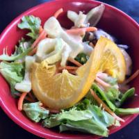 House Salad · Fresh Gourmet Salad with Cucumber Slices and Carrots & Omakase's House Sesame Peanut Dressing