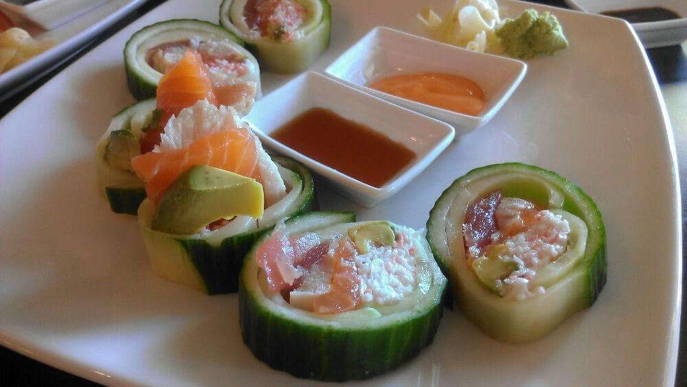 Summer time Roll · RICE-LESS ROLL. Tuna, Salmon, Albacore, Crab & Avocado All Wrapped with Cucumber. Served w/Ponzu sauce and a Side of Spicy Mayo