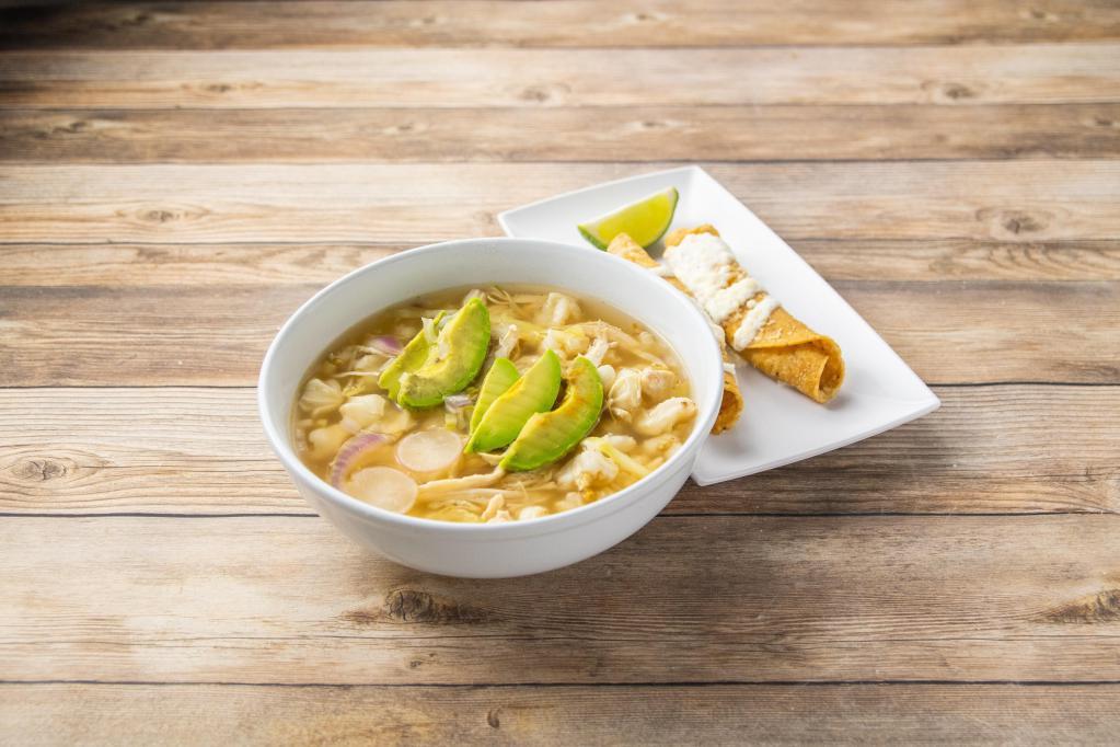 Pozole · Chicken stock served with hominy, shredded chicken, cabbage, radish, onions and avocado. Served with two crispy flautas