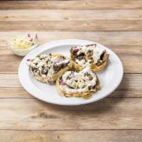 Sopes de Hongos · 3 homemade thick tortillas topped with mushrooms, epazote, queso, sour cream, and onions Veg...