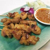 Satay Chicken 马来式雞串 · 4 Marinated chicken on skewer grilled to perfection. Served with onion, cucumber and peanut ...