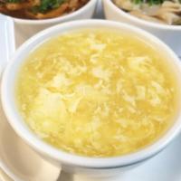 Tofu Egg Drop Soup 蛋花汤 · Soft diced white tofu and eggs in chicken broth base.