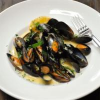 Steamed Fresh Mussels · In white wine butter sauce.