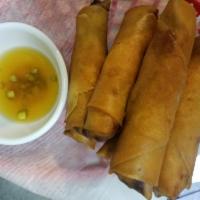 Vegetable Lumpia · Sauteed shredded cabbage, carrots and celery with seasoning (6 pieces).