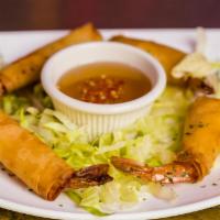 Shrimp Rolls (4pcs) · 4 pieces. Jumbo shrimp wrapped in egg roll wrapper, served with Vietnamese Fish Sauce.
