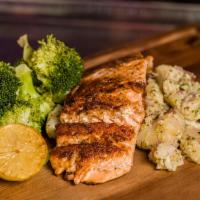Grilled Salmon · 8oz Salmon Fillet.  Fresh Atlantic salmon grilled to perfection.  Served with steamed brocco...