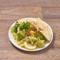 Hummus · Pureed chickpeas mixed with garlic, tahini and lemon juice. Served with pita bread.