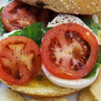 Caprese Sandwich · Served on ciabatta bread. Mozzarella cheese, sliced tomatoes, fresh basil and balsamic dress...