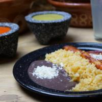 Niño Cheese Enchilada · Served with rice & beans.