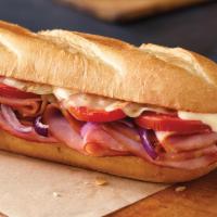 Ham and Cheese Sub · Ham, provolone cheese, banana peppers, tomatoes, red onions, and sub dressing.