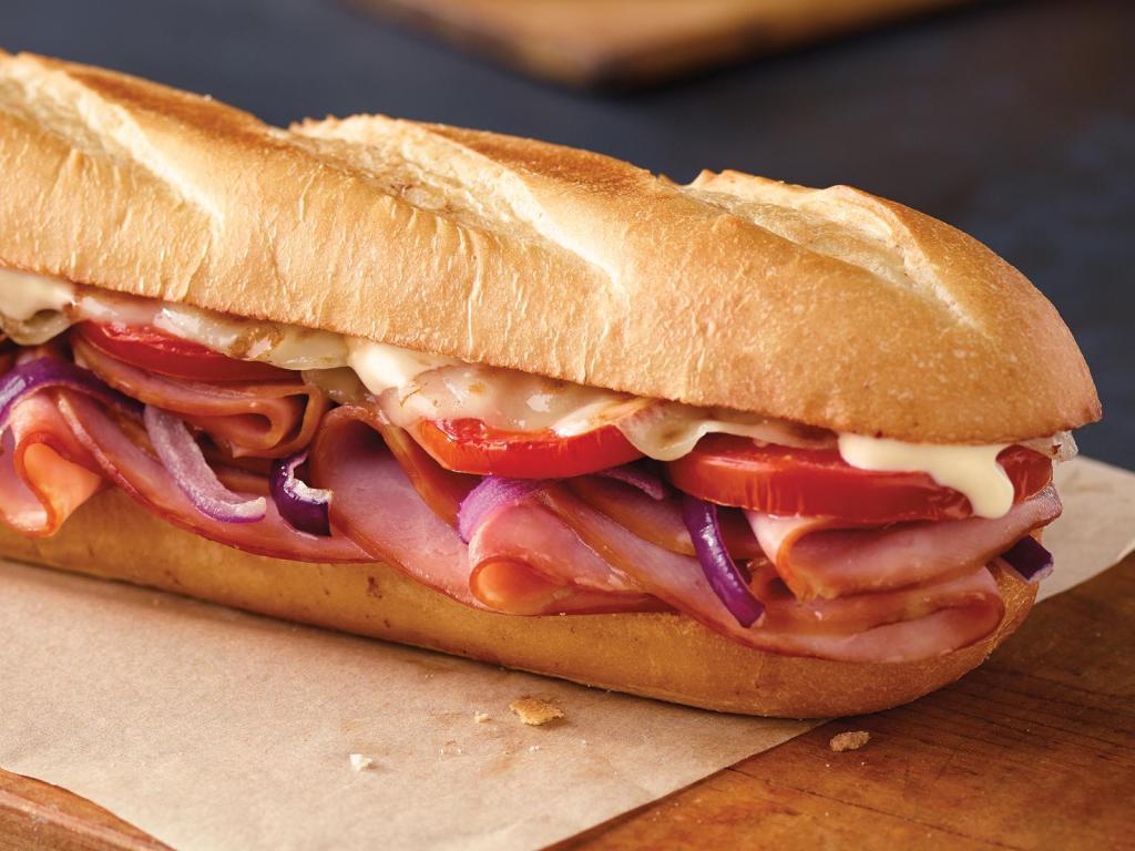 Ham and Cheese Sub · Ham, provolone cheese, tomatoes, red onions and mayo.