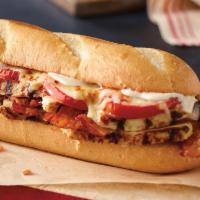 Chicken Club Sub · Chicken breast strips, bacon, tomatoes, mayo and 3 cheese blend.