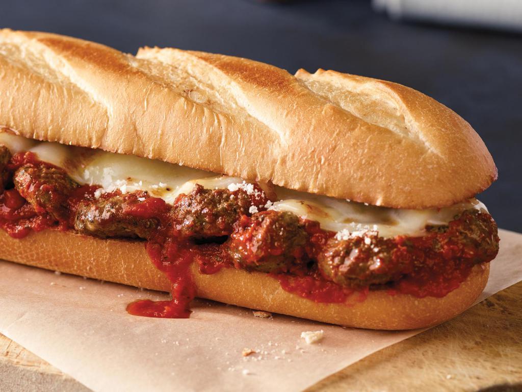 Meatball Sub · Meatballs, provolone cheese and our signature sauce.