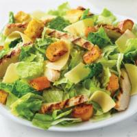 Regular Chicken Caesar Salad · Fresh-cut lettuce blend, grilled chicken, Parmesan cheese and croutons made daily; served wi...