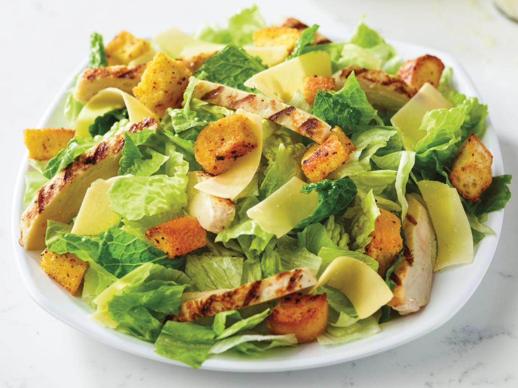 Family Chicken Caesar Salad · Fresh-cut lettuce blend, grilled chicken, Parmesan cheese and croutons made daily; served with Caesar dressing.