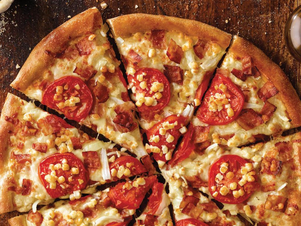 White Cheezy Pizza Original Crust · Bacon, onions, sliced tomatoes, garlic Parmesan sauce and our 3-cheese blend, plus feta.