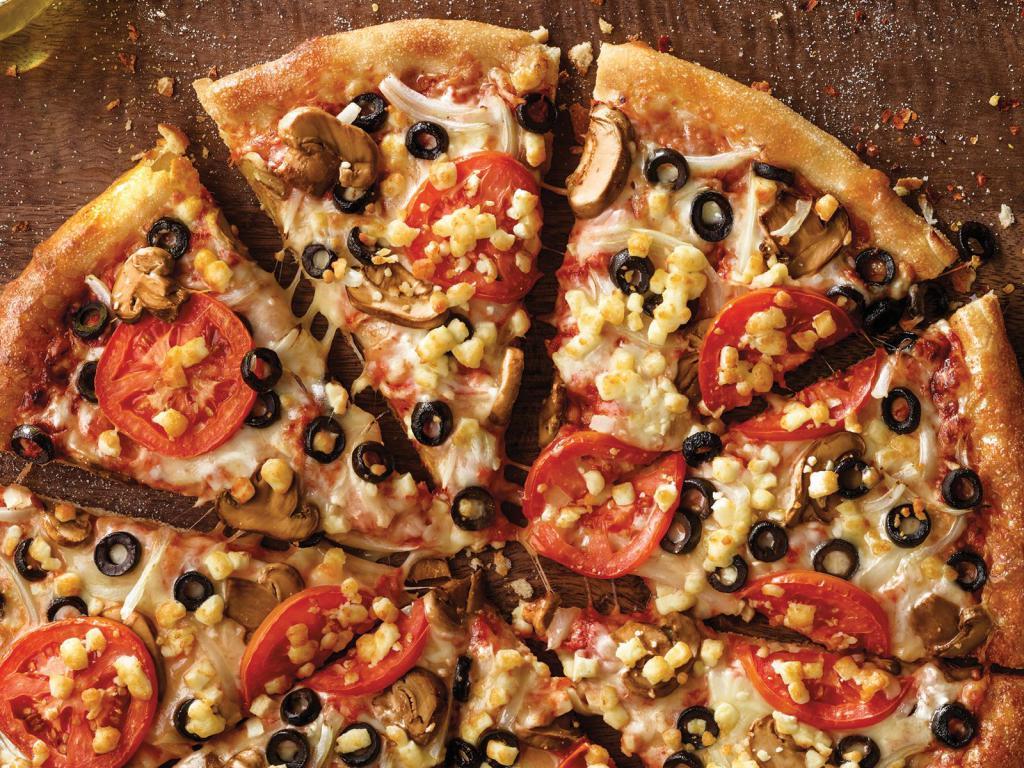 Garden Pizza · Mushrooms, black olives, onions, sliced tomatoes, our original sauce and signature three cheeses, plus feta.