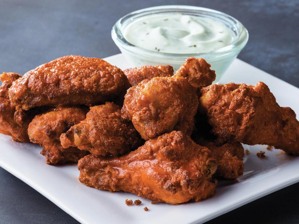 Chicken Wings (15) · 15 classic chicken wings served hot or tangy BBQ style with your choice of dipping sauce.
