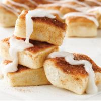 Cinna Squares · Fresh-baked, buttery topped with cinnamon and sugar, served with a side of vanilla icing.