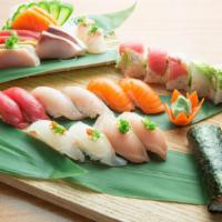 Sushi Box Deluxe · Includes: Organic Edamame, Tuna Sashimi, Albacore Sushi (2), Salmon Sushi (2), Yellowtail Su...