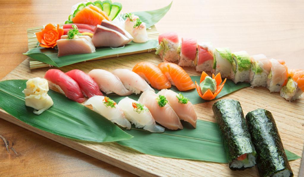 Sushi Box Deluxe · Includes: Organic Edamame, Tuna Sashimi, Albacore Sushi (2), Salmon Sushi (2), Yellowtail Sushi (2), Crab Cut Roll (4), Tuna Cut Roll (4).