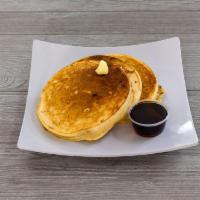 3 Golden Pancakes · 3 fluffy, delicious golden pancakes. Comes with two 2oz Syrups and butter on the side.