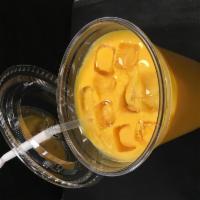Mango Lassi · Mango and yogurt shake.