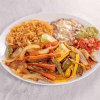 Veggie Fajitas · Served with veggies, onion and bell peppers. Served with rice, beans, pico de gallo and tort...