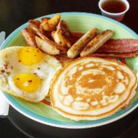 2-2-2-2 Breakfast · 2 eggs, 2 pancakes, 2 bacons and 2 sausages, home fries and toast.