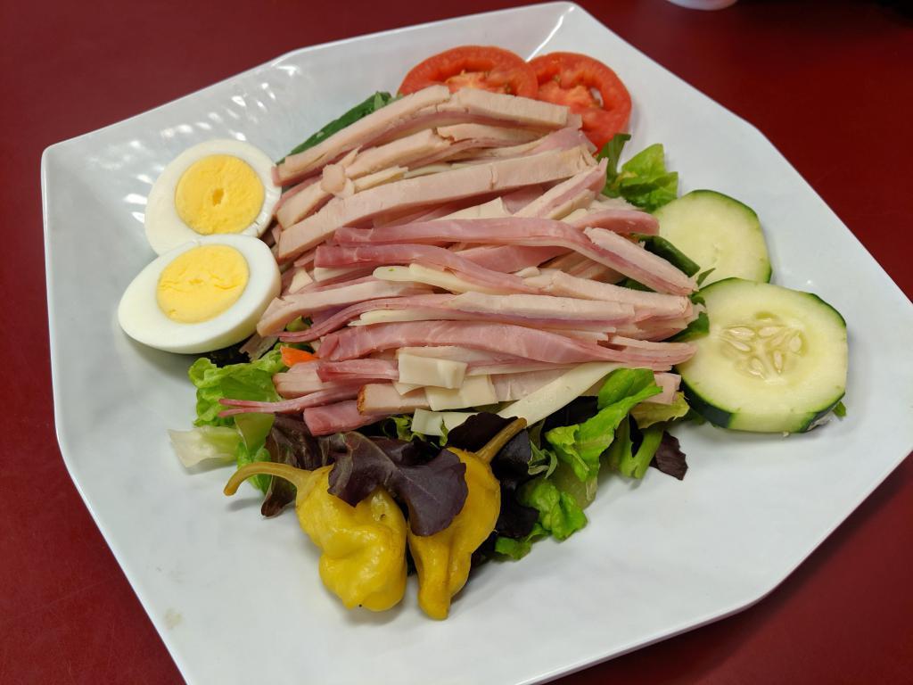 Chef Salad · Lettuce, meat, eggs, and vegetables.